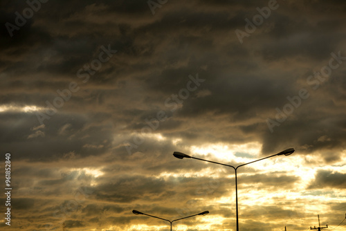 Sunset Clouds Behind The Power Pole