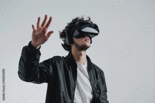 Young man experiences virtual reality