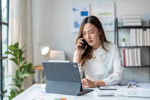 Wallpaper Mural Businesswoman experiencing stress and frustration while working in her office Torontodigital.ca