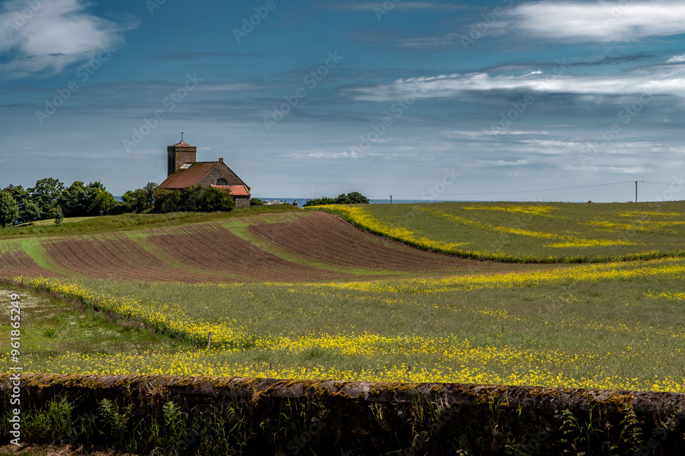 Rural Landscape With Old Church At Village St. Abbs In Berwickshire In Scotland, UK Rural Landscape With Old Church At Village St. Abbs In Berwickshire In Scotland, UK