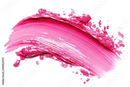 Pink lip gloss sample with smear on white background