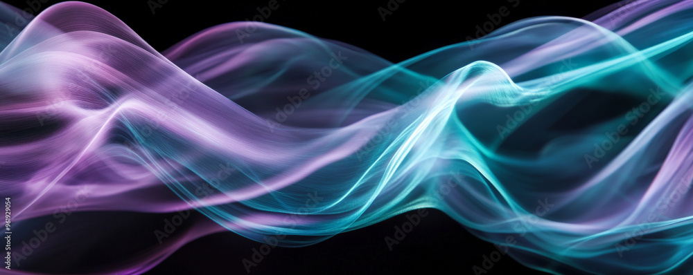 Soft, curving light trails in shades of lavender and teal swirling through the air, creating a gentle, flowing effect on a black background. Soft, curving light trails in shades of lavender and teal swirling through the air, creating a gentle, flowing effect on a black background.