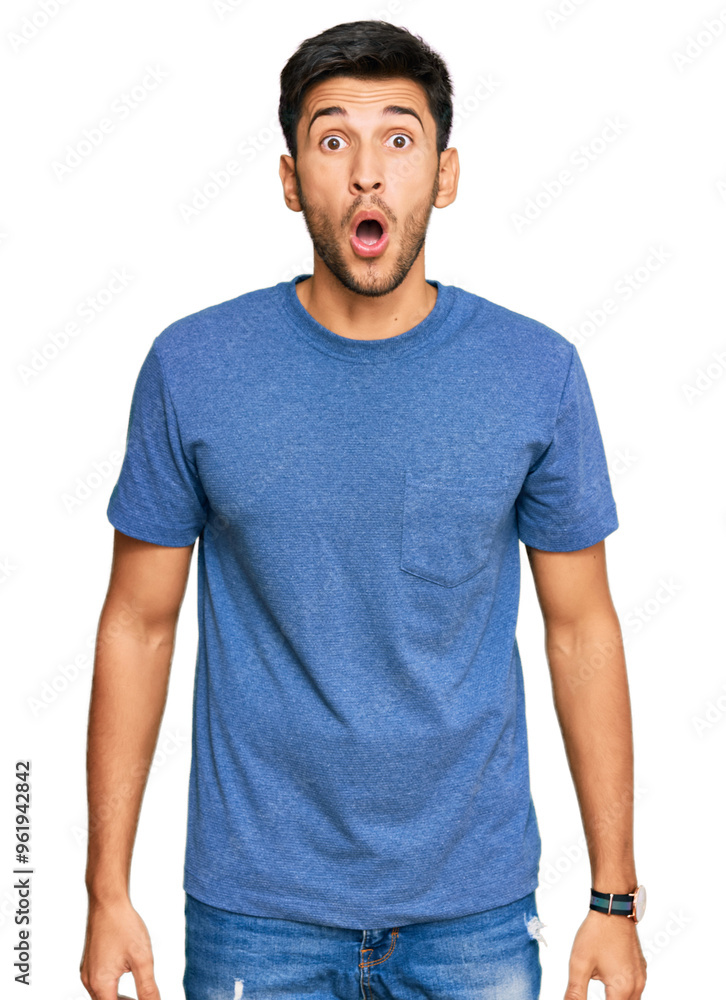 Young handsome man wearing casual clothes scared and amazed with open mouth for surprise, disbelief face Young handsome man wearing casual clothes scared and amazed with open mouth for surprise, disbelief face