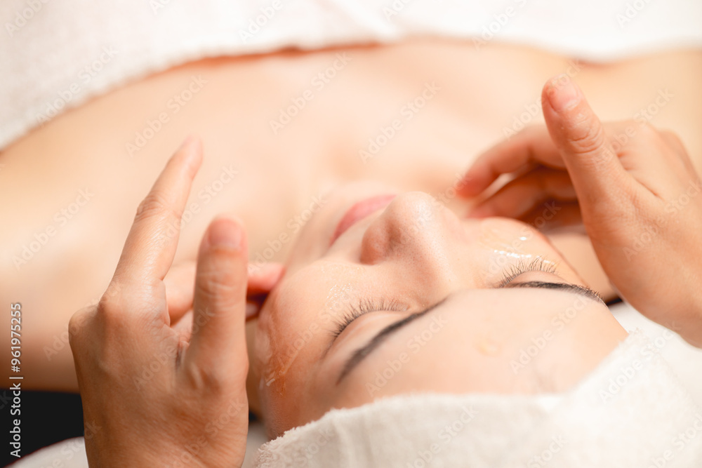 Beautician apply facial herbal cream and hand massage in spa, Face skin treatment body care relax claim with skincare baby face at wellness. Beautician apply facial herbal cream and hand massage in spa, Face skin treatment body care relax claim with skincare baby face at wellness.