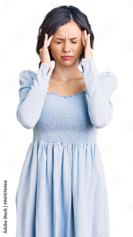 Young beautiful girl wearing casual clothes with hand on head, headache because stress. suffering migraine. Young beautiful girl wearing casual clothes with hand on head, headache because stress. suffering migraine.