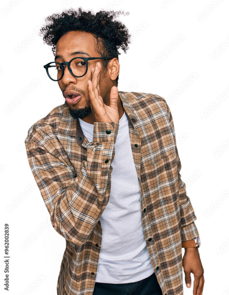 Young african american man with beard wearing casual clothes and glasses hand on mouth telling secret rumor, whispering malicious talk conversation