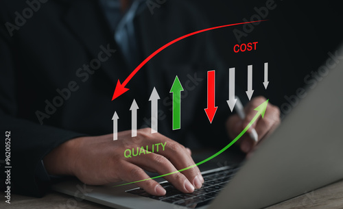 businessman works on laptop, visualizing strategies for cost reduction and quality improvement. Dynamic arrows on screen represent business analysis, driving efficiency and innovation in his workflow