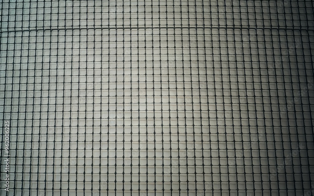 Grid pattern texture. Abstract background of a grid pattern texture, perfect for minimalist design, architectural, and industrial projects. Grid pattern texture. Abstract background of a grid pattern texture, perfect for minimalist design, architectural, and industrial projects.