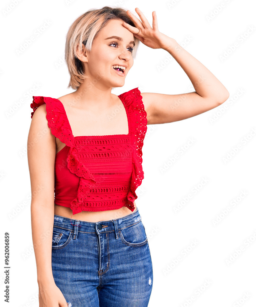 Young beautiful blonde woman wearing casual clothes very happy and smiling looking far away with hand over head. searching concept. Young beautiful blonde woman wearing casual clothes very happy and smiling looking far away with hand over head. searching concept.