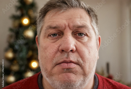 Mature man in a red sweater...