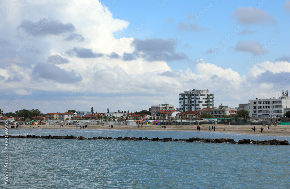 condominiums and hotels on the seashore to accommodate tourists during the summer season condominiums and hotels on the seashore to accommodate tourists during the summer season