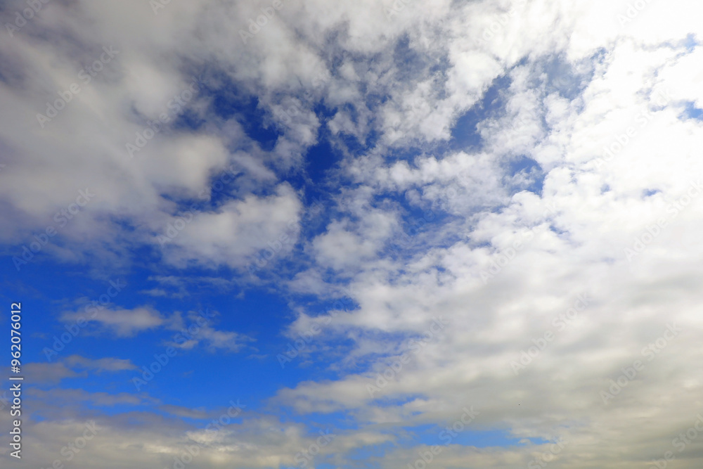 deep blue sky with clouds ideal as a backdrop for nature or weather forecast deep blue sky with clouds ideal as a backdrop for nature or weather forecast
