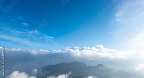 Prau Mountain panorama with blue sky and white clouds in Dieng, Wonosobo, Indonesia. Concept for International Day of Forest, World Environment Day.