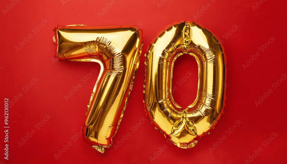 Balloon in shape of number 70 against vivid red backdrop. Happy Birthday. Holiday celebration Balloon in shape of number 70 against vivid red backdrop. Happy Birthday. Holiday celebration