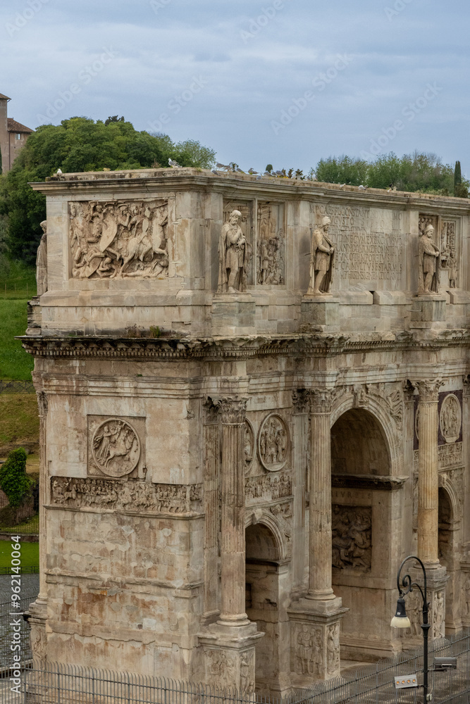 Stunning view of the Arch of Constantine in Rome, Italy. This iconic Roman monument, built in 315 AD, showcases detailed reliefs commemorating Emperor Constantine’s victories. Stunning view of the Arch of Constantine in Rome, Italy. This iconic Roman monument, built in 315 AD, showcases detailed reliefs commemorating Emperor Constantine’s victories.