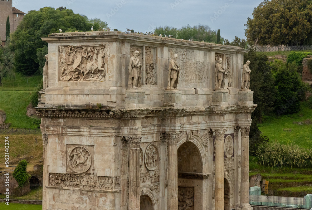 Stunning view of the Arch of Constantine in Rome, Italy. This iconic Roman monument, built in 315 AD, showcases detailed reliefs commemorating Emperor Constantine’s victories. Stunning view of the Arch of Constantine in Rome, Italy. This iconic Roman monument, built in 315 AD, showcases detailed reliefs commemorating Emperor Constantine’s victories.