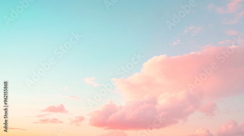 Soft pink and blue clouds in a pastel sky.