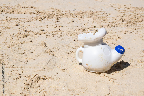 colorful sea beach toy on the sand photo