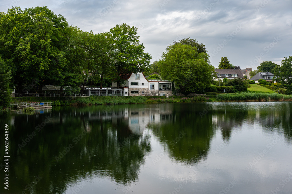 Aachen, Germany, July 26, 2024 - Natural reflections of the Diepenbenden water pond Aachen, Germany, July 26, 2024 - Natural reflections of the Diepenbenden water pond