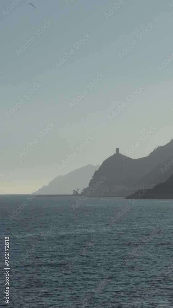Sunset on the Mediterranean coast with a ancient watchtower. 4K Vertical Sunset on the Mediterranean coast with a ancient watchtower. 4K Vertical