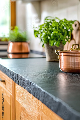 a soapstone countertop with a matte finish in the foreground, set against a softly blurred background of a rustic Italian-style kitchen, vertical photo