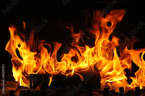 Roaring fire up close in a fireplace