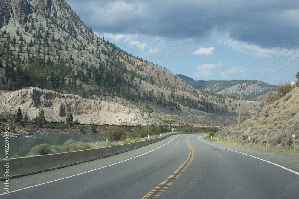 Fototapeta premium Winding Road Through Mountainous Valley
