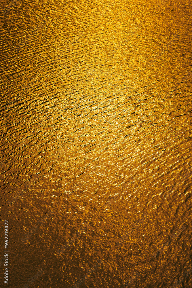 Naklejka premium Yellow Sunlight Reflections on Lulusar Lake, Pakistan