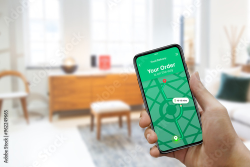 Obraz na plátne Take away ordering food online from home on moblie device app, food delivery on
