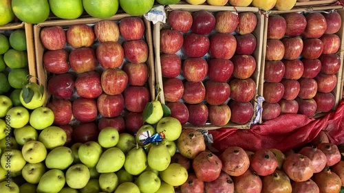 Horizental View of a Beautiful Fruit Shop Persian Limes Pears and Pomegranate Fruit photo