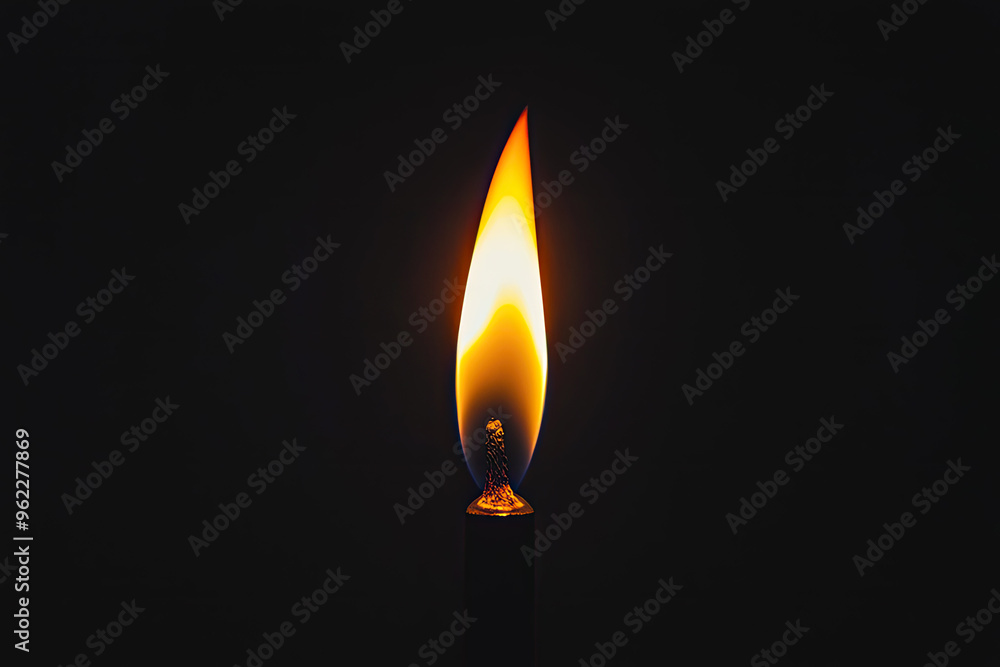 A solitary candle flame dances in the darkness, its warm glow a beacon of hope amidst the shadows. A solitary candle flame dances in the darkness, its warm glow a beacon of hope amidst the shadows.