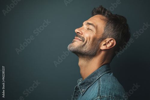 a close up of a smiling man's face