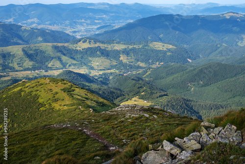 aerial perspective landscape of silhouettes of mountains from rocky slopes an...