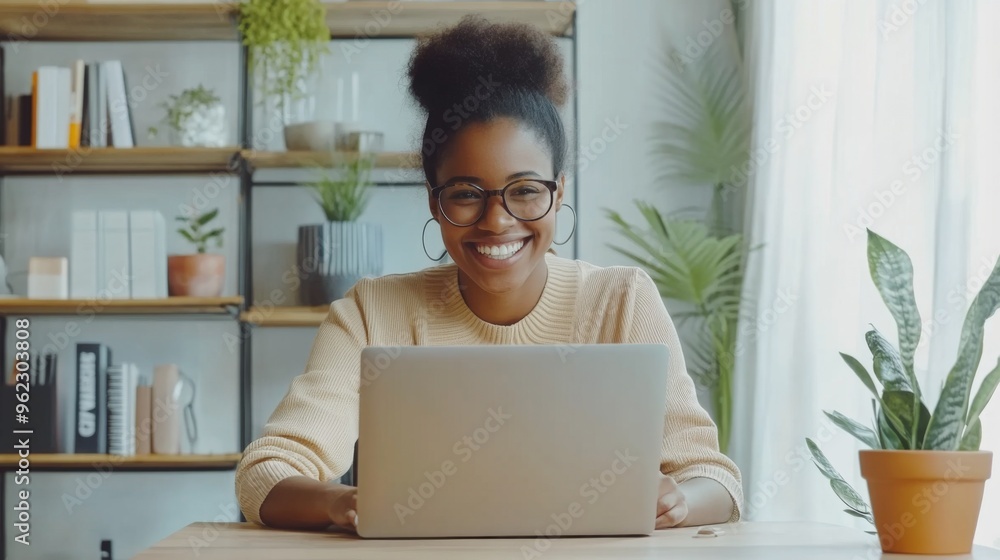 Smiling Woman Working on Laptop Smiling Woman Working on Laptop