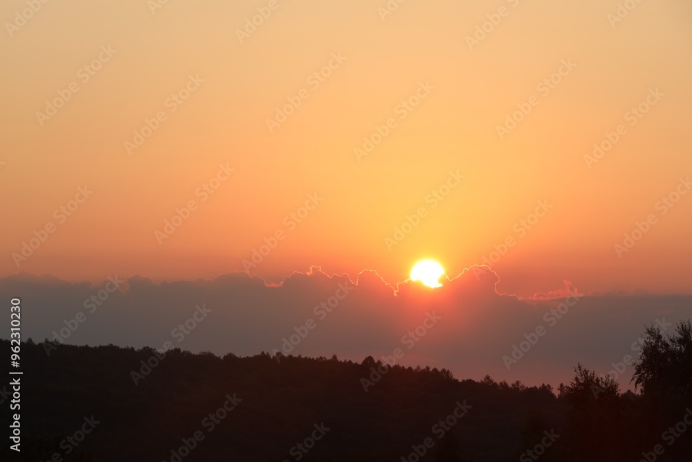 Beautiful view of sky over meadow at sunrise in morning Beautiful view of sky over meadow at sunrise in morning