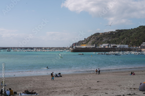 Central beach of Erquy in french Brittany, with windy conditions photo