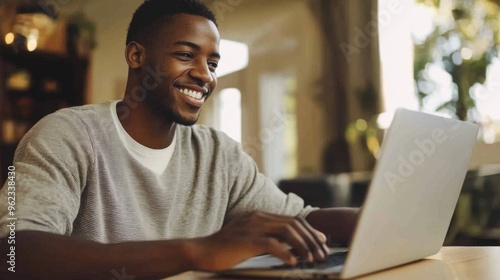 Young Man Working on Laptop