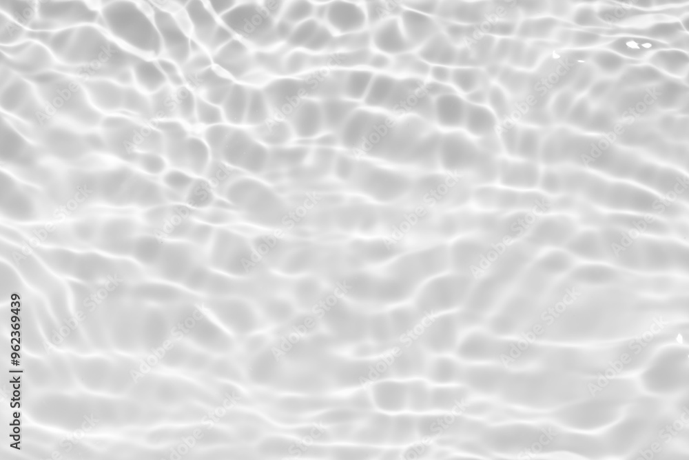 White water with ripples on the surface. Defocus blurred transparent white colored clear calm water surface texture with splashes and bubbles. Water waves with shining pattern texture background. White water with ripples on the surface. Defocus blurred transparent white colored clear calm water surface texture with splashes and bubbles. Water waves with shining pattern texture background.
