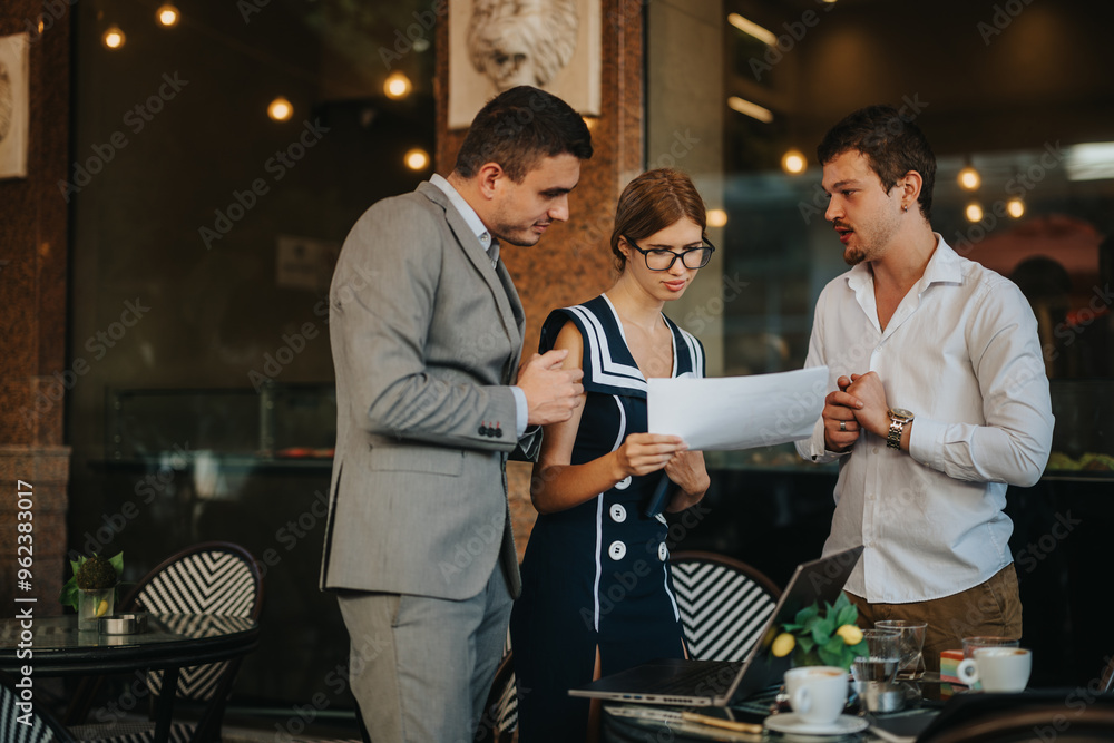 Business team meeting outside, discussing sales strategies and analyzing growth reports in a relaxed cafe atmosphere. Business team meeting outside, discussing sales strategies and analyzing growth reports in a relaxed cafe atmosphere.