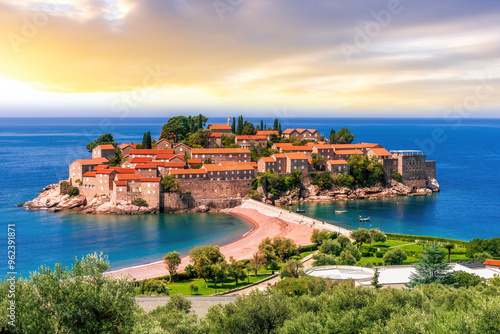 beautiful summer landscape of amazing resort on amazing island with yellow ancient walls and orange tile roofs among sea vawes and nice blue sky on background