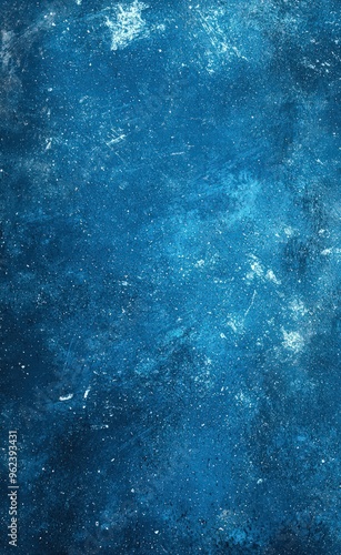 Blue background with white speckles, black spots, and top-down perspective.