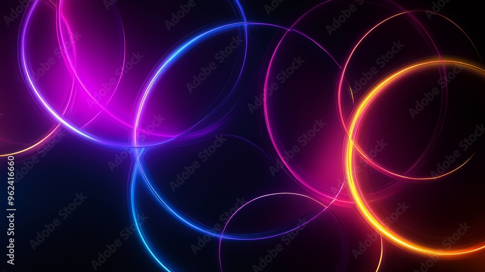 Abstract glowing neon circles in pink, blue, and orange on a black background. Abstract glowing neon circles in pink, blue, and orange on a black background.