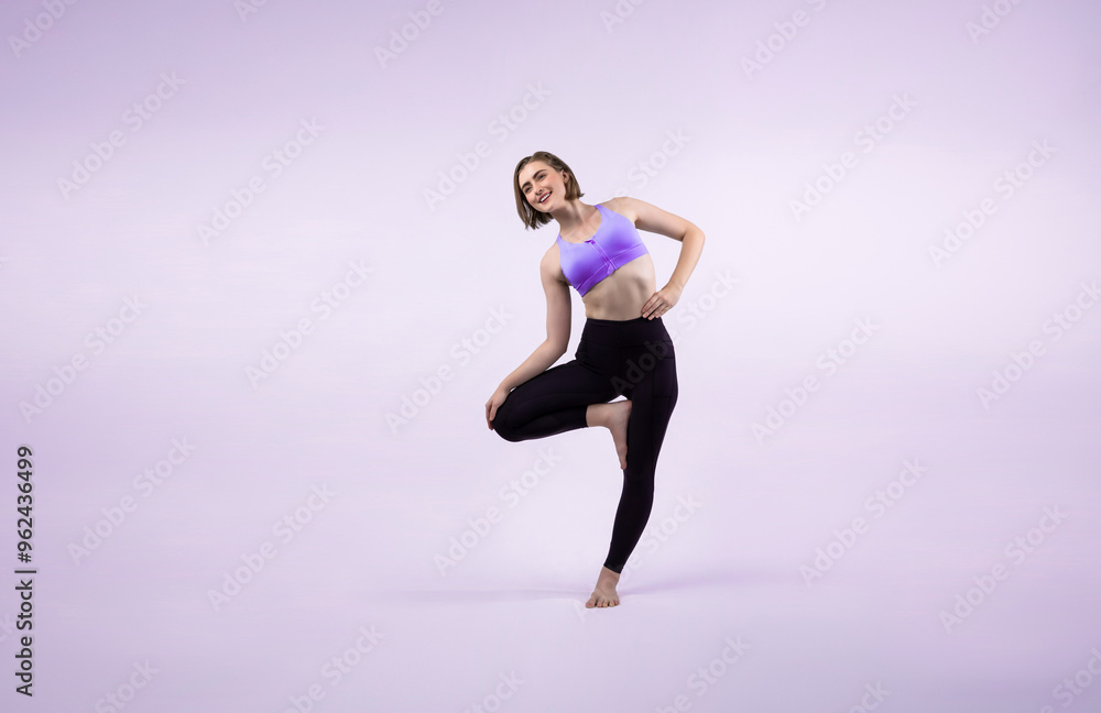 Obraz premium Full body length gaiety shot athletic and sporty woman doing healthy and meditative yoga exercise workout posture on isolated background. Healthy active and body care lifestyle