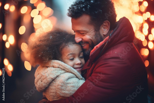 A father and daughter embrace, their connection evident in the warmth of their hug. Father's Day