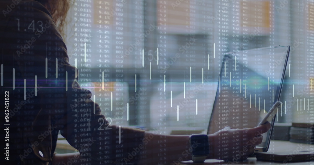 Fototapeta premium Image of diagrams and data processing over businesswoman using laptop