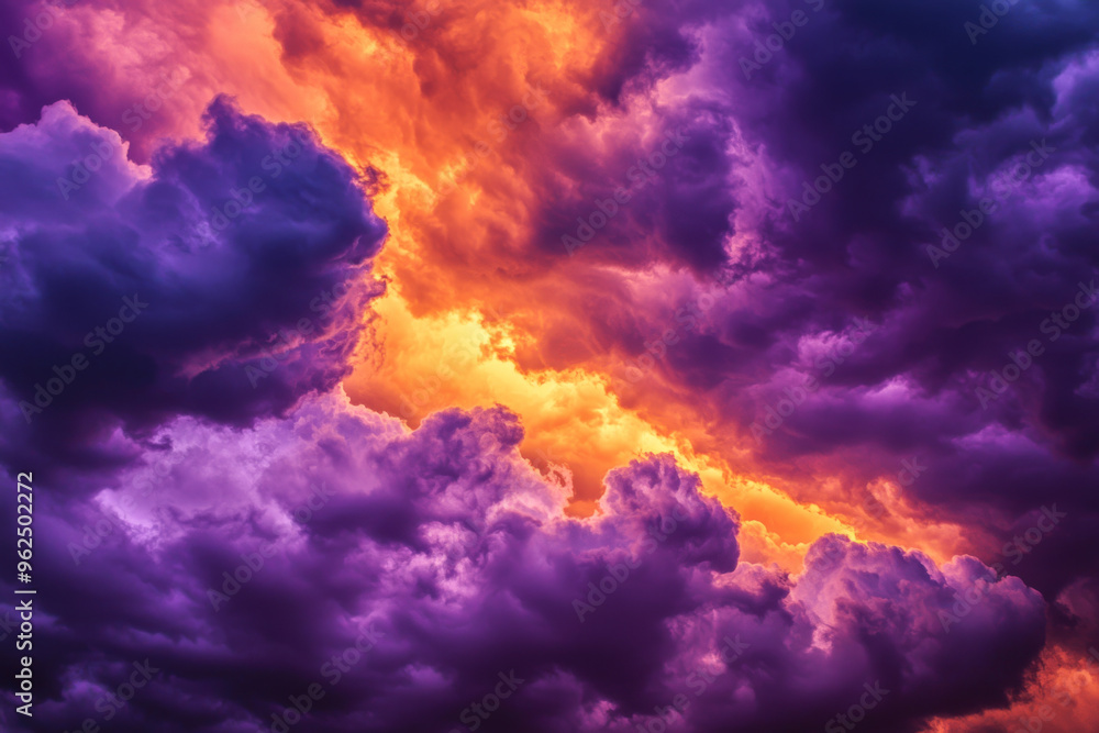A dramatic sky filled with vibrant, swirling clouds in shades of purple and orange, evoking a sense of awe. A dramatic sky filled with vibrant, swirling clouds in shades of purple and orange, evoking a sense of awe.