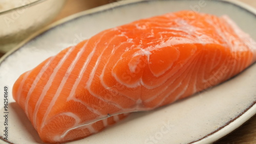 Fresh Raw Salmon Fillet on a Plate 