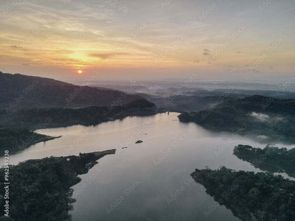 Fototapeta premium Top aerial view landscape of clear lake named Sermo lake on a bright day.