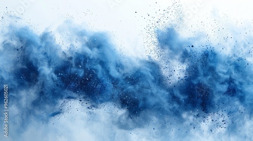 Abstract blue dust explosion on white background. Freeze motion of blue powder splash. Painted Holi in festival. photo