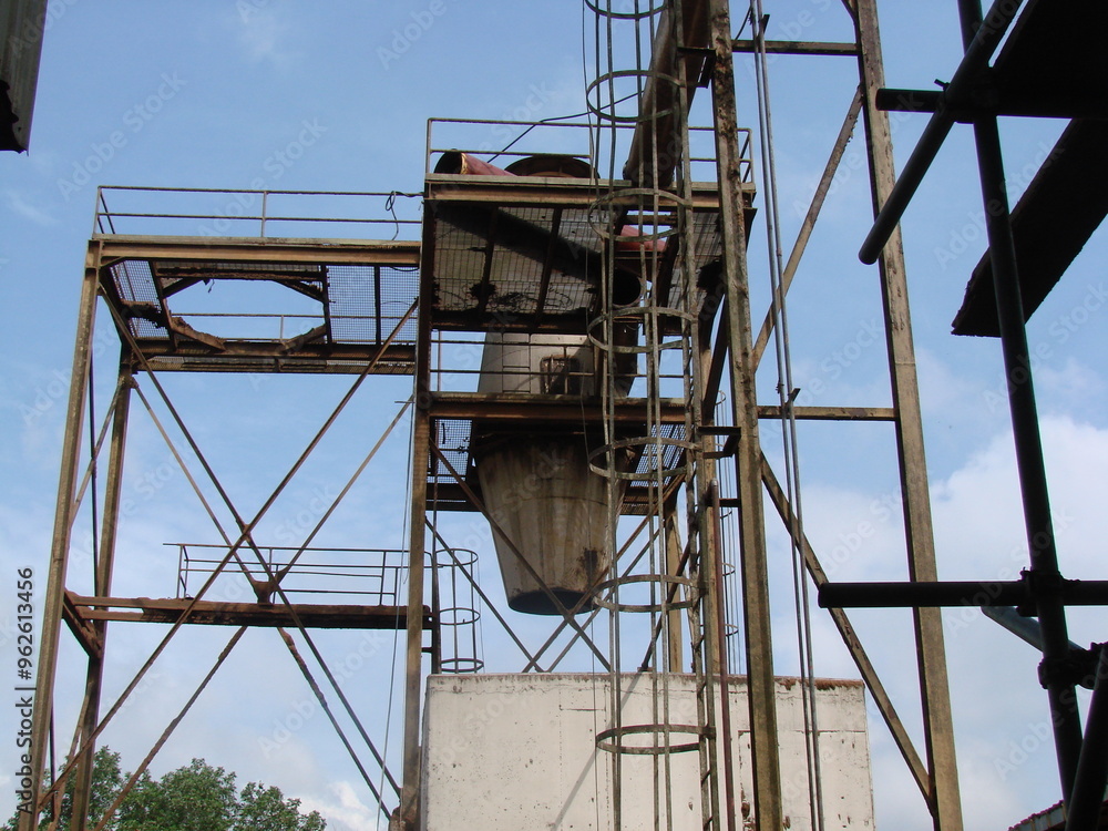 Bintulu, Malaysia - November 8, 2006: The machineries, equipment, production line, working conditions and general view of the manufacturing environment within a Medium Density Fiberboard factory and p
